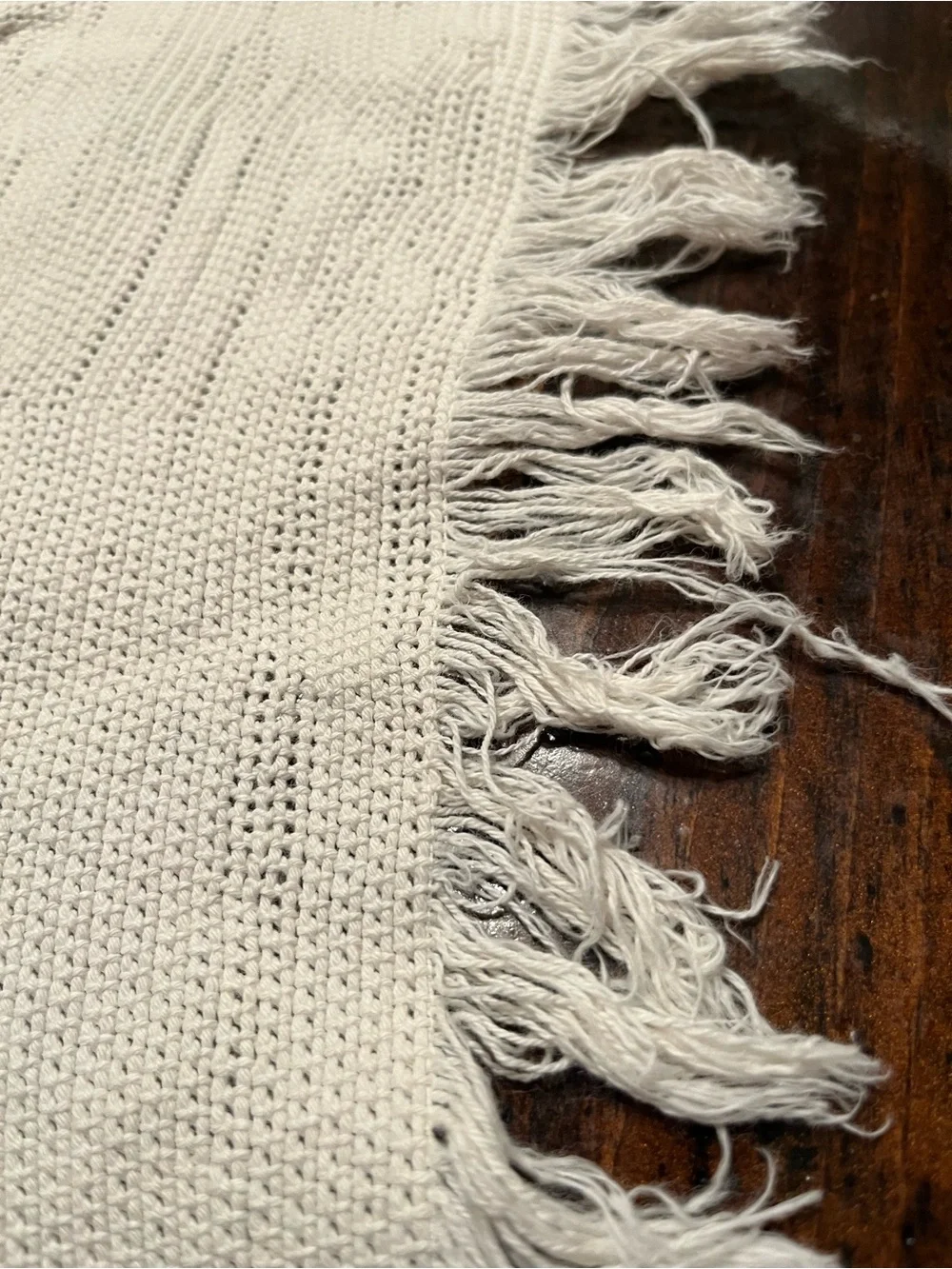 Cream Fringed table scarf or dresser scarf.